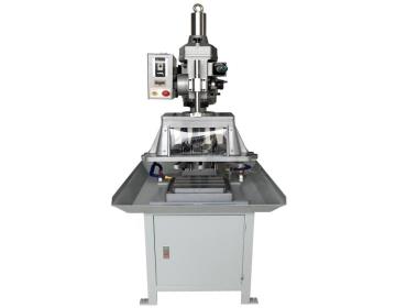 Tapping machine